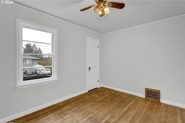 1212 Laurel St Unit 9, Lake Oswego, OR 97034 - unfurnished room with wood finished floors, baseboards, crown molding, and a ceiling fan