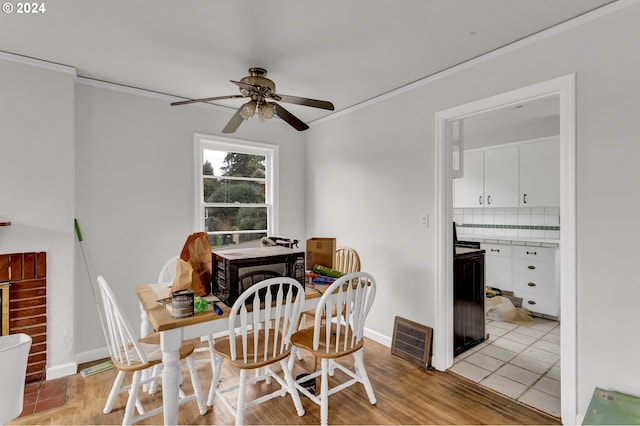 1212 Laurel St Unit 9, Lake Oswego, OR 97034 - dining area with a ceiling fan, ornamental molding, baseboards, and light tile patterned flooring