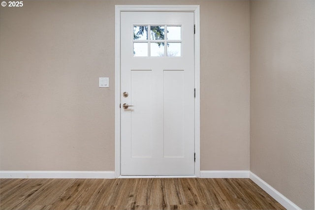 entrance foyer with hardwood / wood-style floors