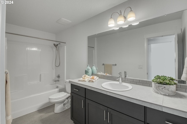 full bathroom with vanity, toilet, and shower / bathtub combination