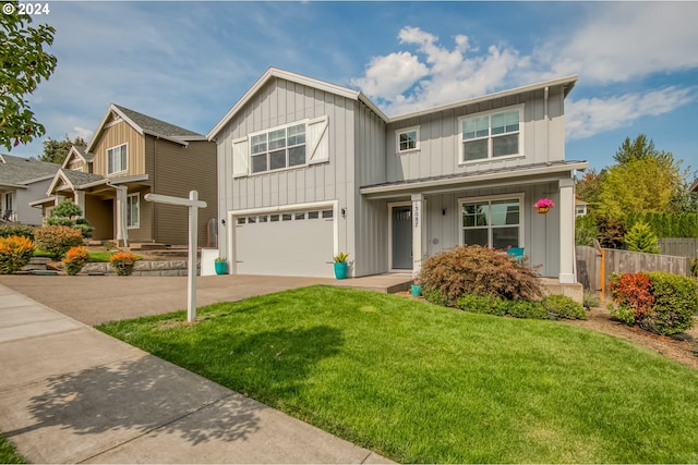 view of front facade featuring a garage and a front yard