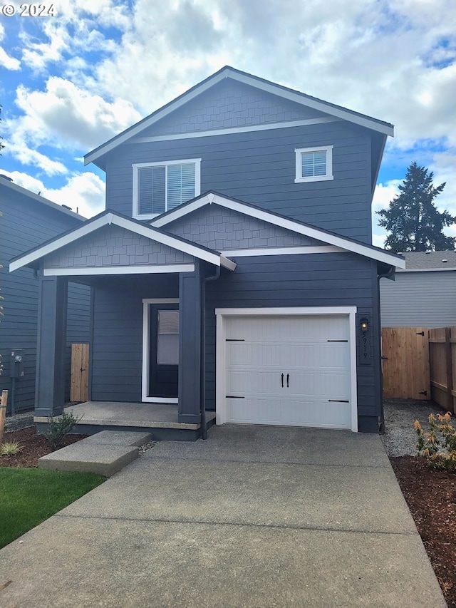 view of front of property with a garage