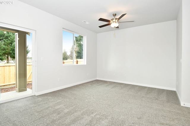 unfurnished room featuring carpet flooring and ceiling fan