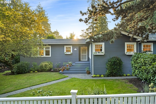 view of front facade with a front yard