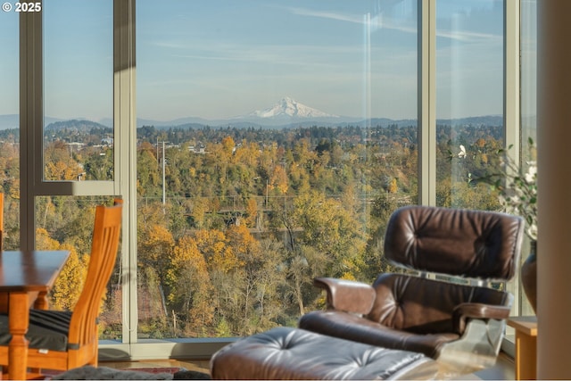 interior space featuring a wooded view