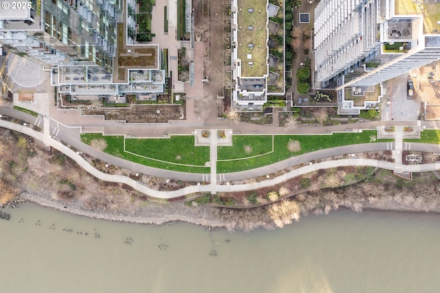 birds eye view of property featuring a water view