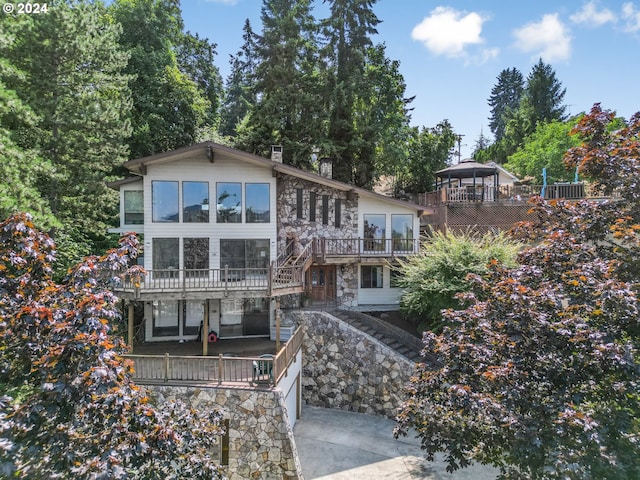 view of front of house with a wooden deck