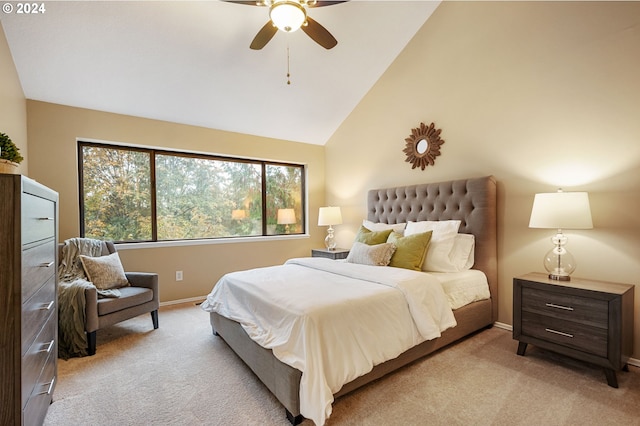 bedroom featuring light carpet, high vaulted ceiling, and ceiling fan