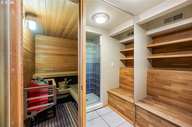 view of sauna / steam room with tile patterned floors