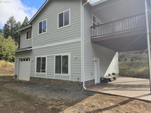 back of house featuring a patio area