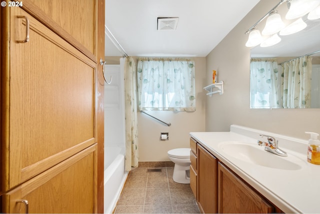 full bathroom featuring vanity, toilet, shower / bath combo with shower curtain, and plenty of natural light