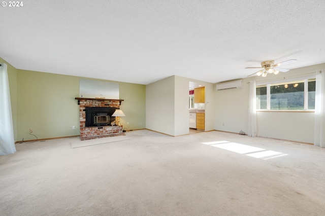 unfurnished living room featuring a wall mounted AC, light carpet, a wood stove, and ceiling fan