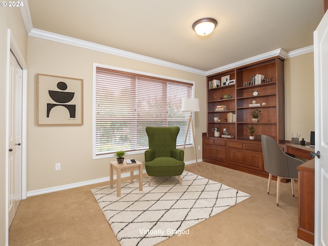 sitting room with ornamental molding and light colored carpet