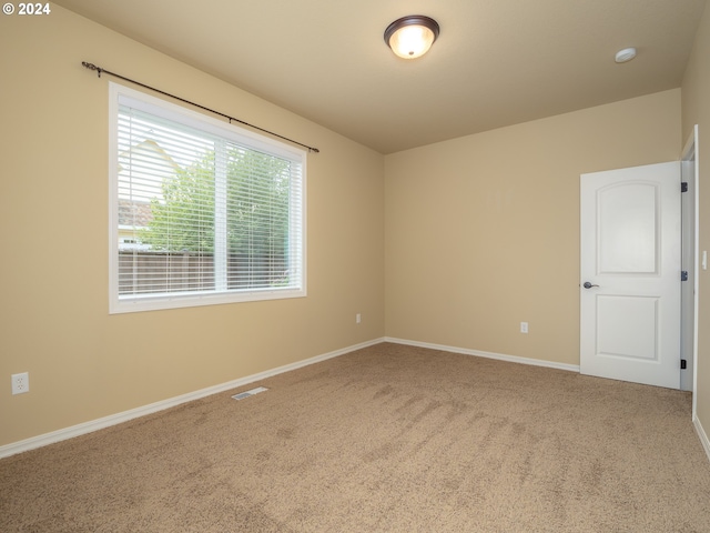 empty room with carpet floors