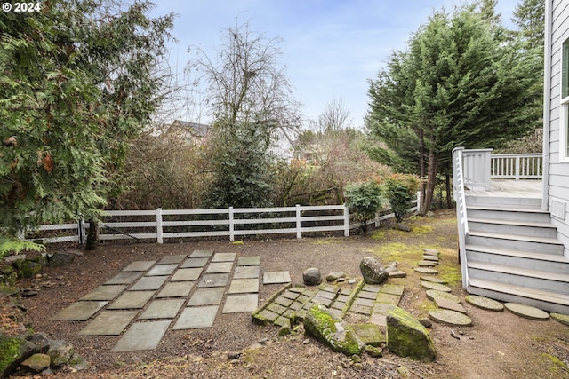 view of yard with a wooden deck