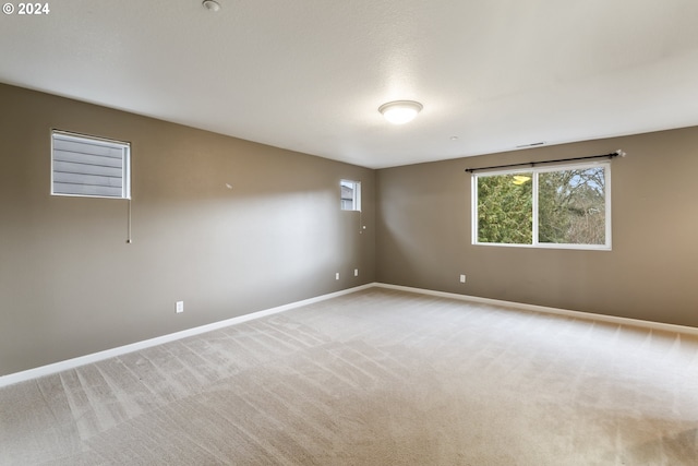 view of carpeted spare room