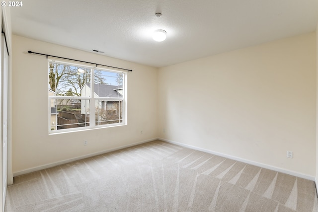 empty room with light carpet