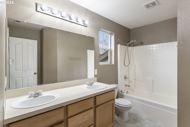 full bathroom with toilet, vanity, and bathing tub / shower combination