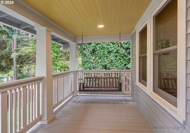 wooden deck featuring a porch