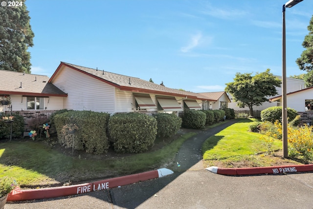 exterior space featuring a front lawn