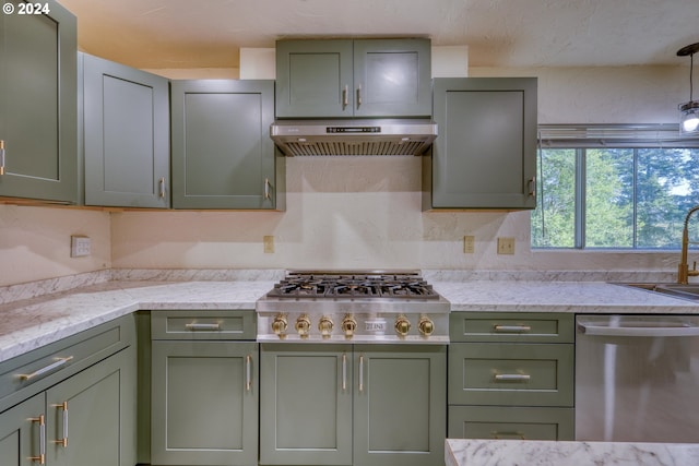 kitchen featuring green cabinets, appliances with stainless steel finishes, and under cabinet range hood