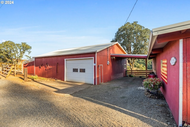 garage featuring wood walls