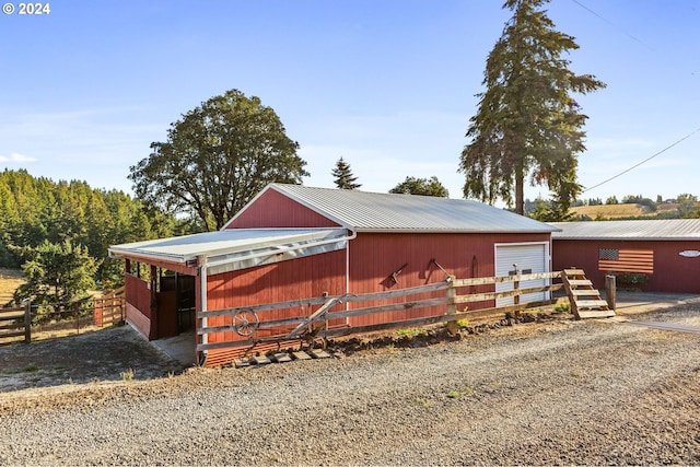 view of side of property featuring an outdoor structure