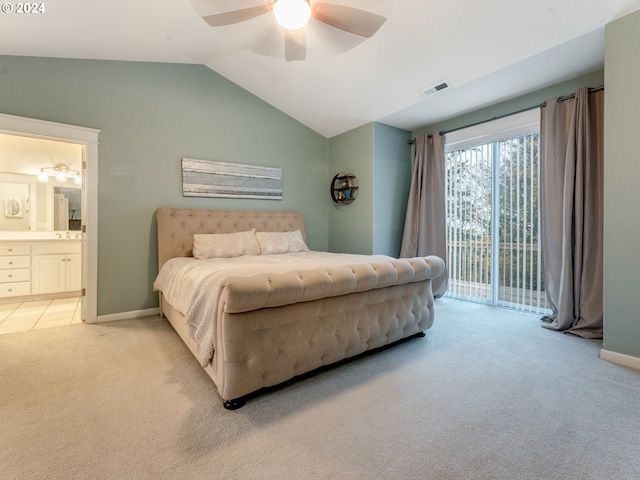 carpeted bedroom with access to outside, connected bathroom, ceiling fan, and vaulted ceiling