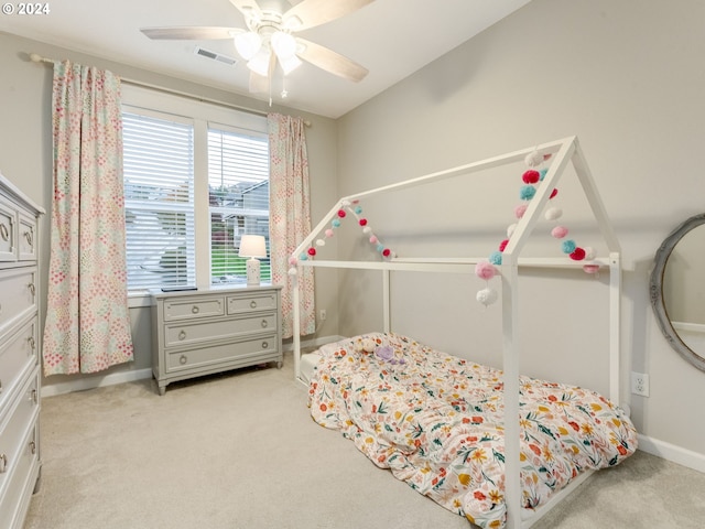 carpeted bedroom with ceiling fan