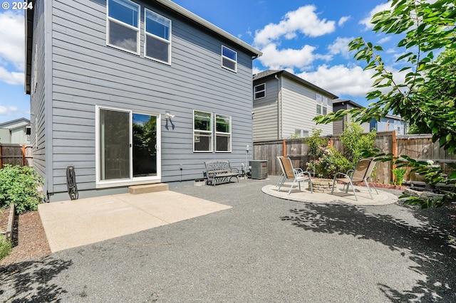 back of property with a patio area