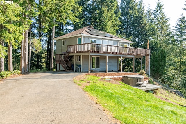 view of front of property featuring a deck