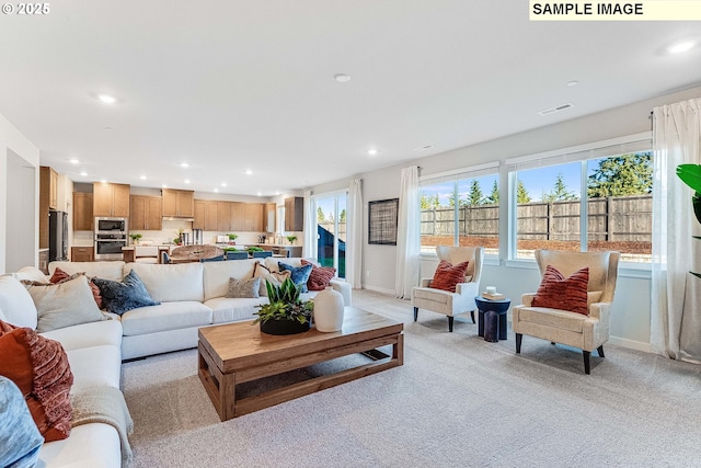 16910 NE 38th Ave, Vancouver, WA 98686 - living area featuring baseboards, visible vents, recessed lighting, and light colored carpet