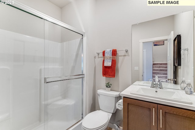 16910 NE 38th Ave, Vancouver, WA 98686 - full bathroom featuring a shower stall, toilet, and vanity