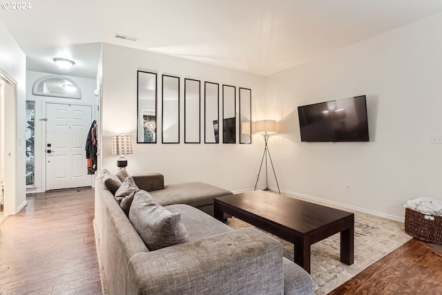 living room with hardwood / wood-style floors