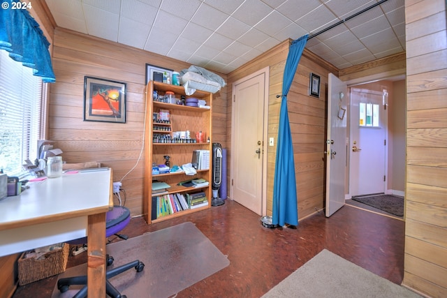 office featuring wood walls