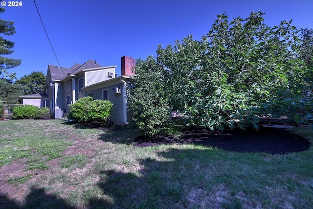 view of home's exterior featuring a yard