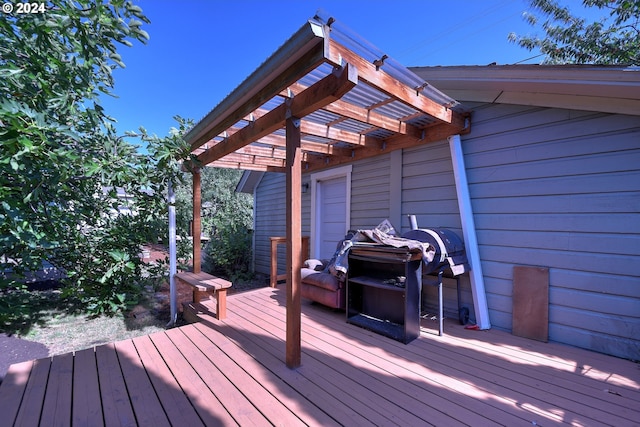 wooden deck with a pergola