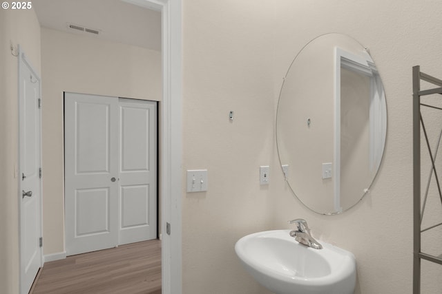 59 NE 134th Pl, Portland, OR 97230 - bathroom with a sink and wood finished floors