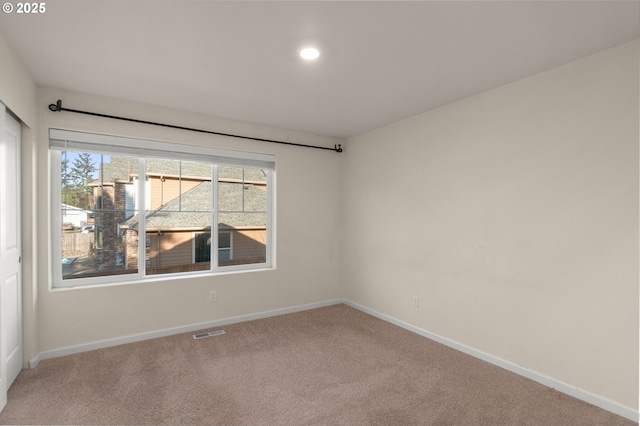 59 NE 134th Pl, Portland, OR 97230 - carpeted empty room with baseboards and recessed lighting