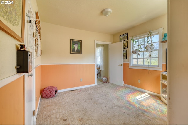 empty room with carpet flooring