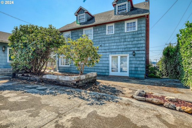 back of house with a patio area