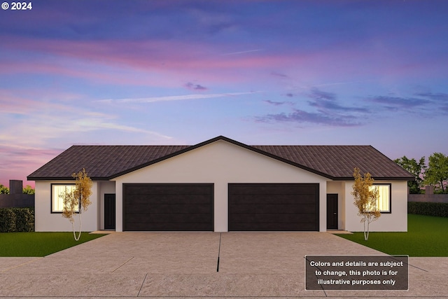 ranch-style house with a garage and a lawn