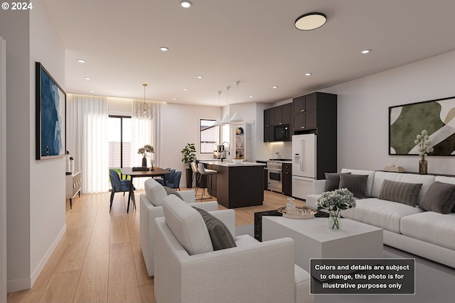 living room with light wood-type flooring and a chandelier