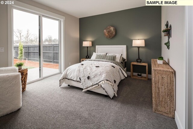 bedroom featuring access to outside and carpet flooring