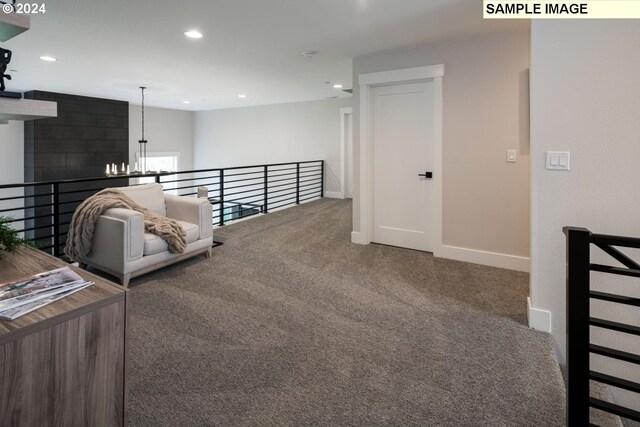 hallway featuring carpet flooring