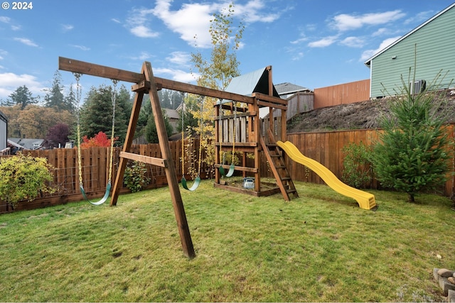 view of playground featuring a lawn