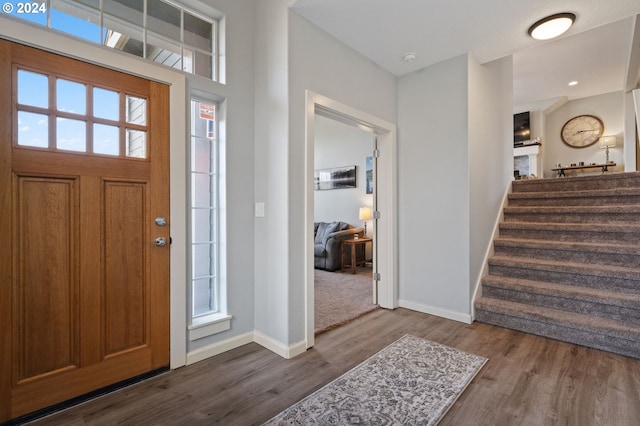 6905 Flicker Dr SE, Salem, OR 97306 - entrance foyer with wood finished floors, baseboards, stairway, and recessed lighting