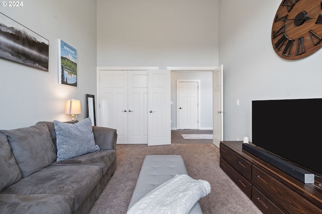 6905 Flicker Dr SE, Salem, OR 97306 - living area featuring a high ceiling and carpet floors