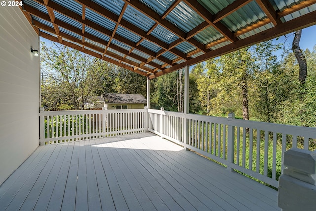 wooden terrace featuring a grill