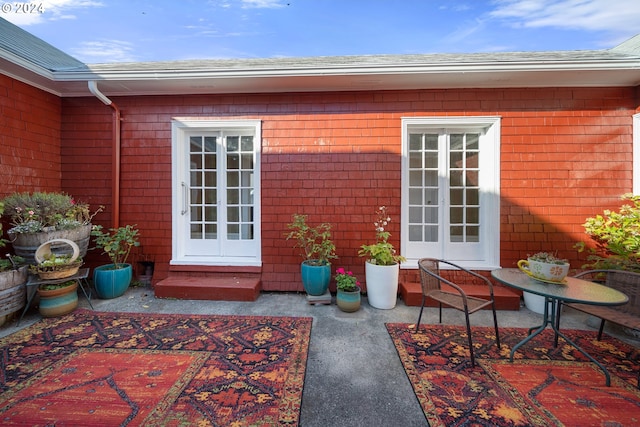 property entrance with a patio area